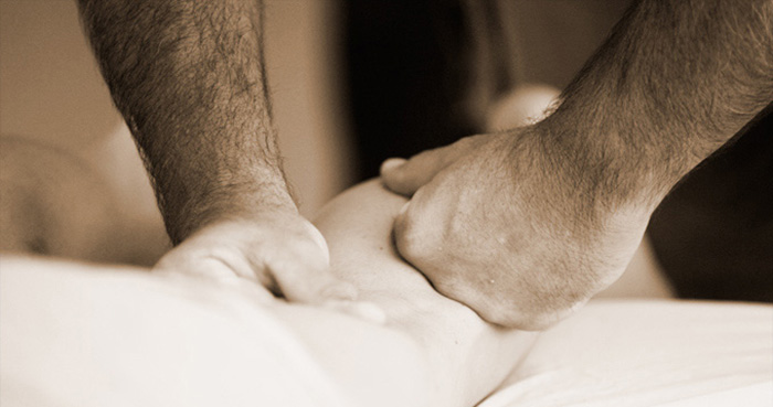 Bryan Lindquist, LMT performing clinical massage in Salt Lake City